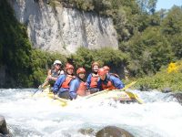 Rafting by a cliff face on the Tongariro